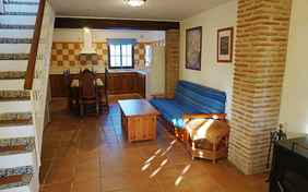 Haus 5: Die Wohnküche mit Ofen